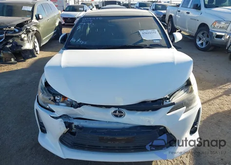 2014 Scion Tc Monogram z USA, uszkodzony, nr VIN JTKJF5C76E3084090